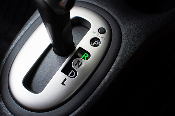 Why Does Your Car Take Several Seconds to Move After You Shift Into Reverse?